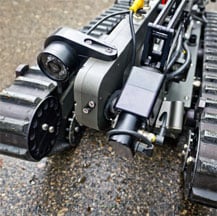 Robotic tracked vehicles are powered by composite CJ and Ultracomp bearings. 机器人跟踪车辆由复合CJ和Ultracomp轴承。